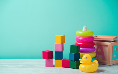Baby toys on wooden table
