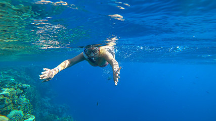 woman and snorkeling