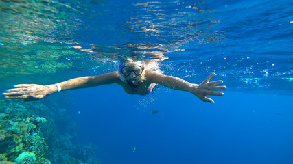 woman and snorkeling