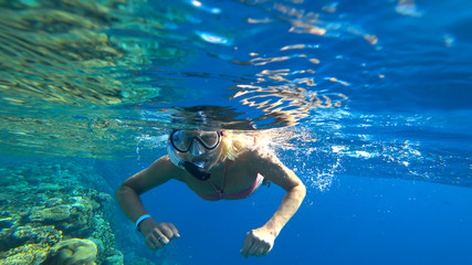 woman and snorkeling