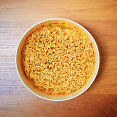 Instant noodles on wood baord
