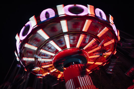 Merry go round in movement at night