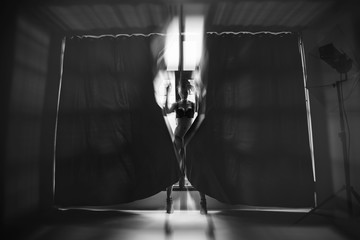 Portrait of beautiful woman at studio, old style, monochrome