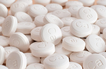 Calcium pills with text 