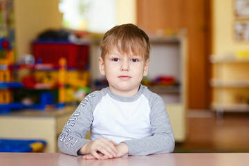 portrait of a five-year-old child in a kindergarten