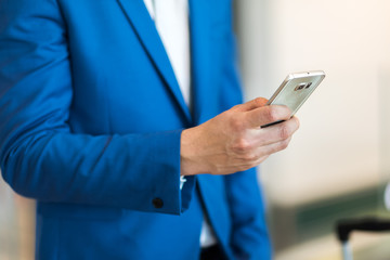 Closeup of a man using a smartphone