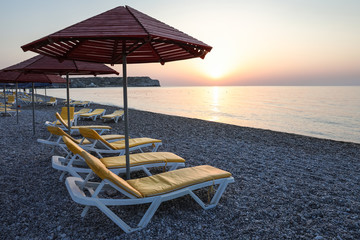 The main beach of Kolymbia, a sun-soaked resort in an idyllic place between mountains and the sea. Rhodes, Greece.