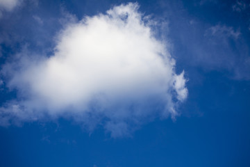 White clouds on the blue sky.