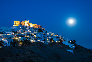 Panoramic view of  the Venetian castle on a full moon night in Astypalaia, an Aegean island of Greece