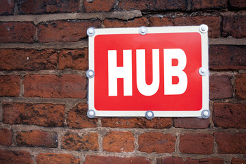 Hand writing text caption inspiration showing HUB concept meaning HUB Advertisement written on old announcement road sign with background and copy space
