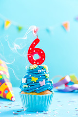 Sixth 6th birthday cupcake with candle blow out.Card mockup. - obrazy, fototapety, plakaty