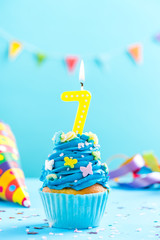 Seventh 7th birthday cupcake with candle. Card mockup.