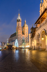 Christmas tree, St Mary's church, Cloth Hall on Main Market Square in Krakow, illuminated in the night