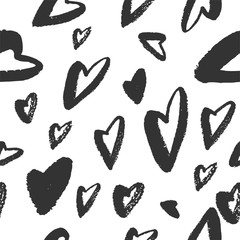 Hand drawn texture. Hearts, brush strokes, seamless pattern made with ink. Artistic fabric pattern. Valentine's day background
