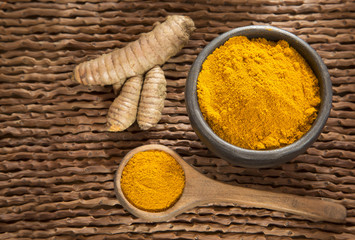Roots and turmeric powder - Curcuma longa