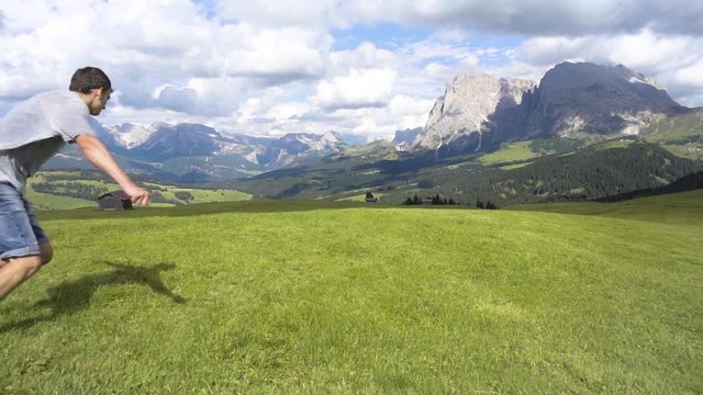 240 fps super slow motion parkour cork jump with mountain Langkofel and Plattkofel near Alpi di Siusi