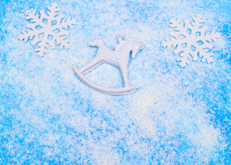 Christmas blue background with a snow and new year symbols 
