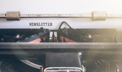 word newsletter written on vintage manual typewriter