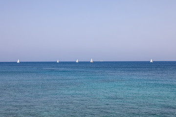 white boats in the Mediterranean sea