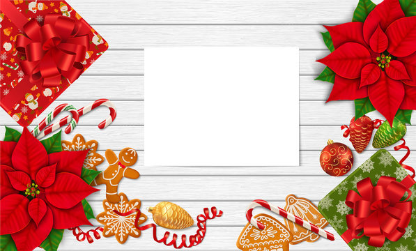 Horizontal mock-up with Christmas items and paper sheet for your design. Poinsettia, gingerbread cookies, candy canes, Christmas ornaments and gift box on the white wooden background. Top view.Vector