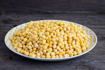 Yellow peas on a plate.