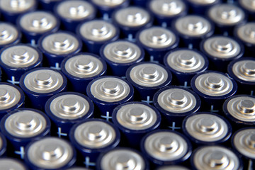 Composition with alkaline batteries