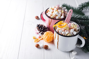 two cups with hot chocolate or cocoa with marshmallow