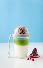 breakfast or lunch from yoghurt and freshly squeezed kiwi and apple smoothies, and whole grain cereal in the lid in Disposable Plastic Milkshake Cup . healthy eating
