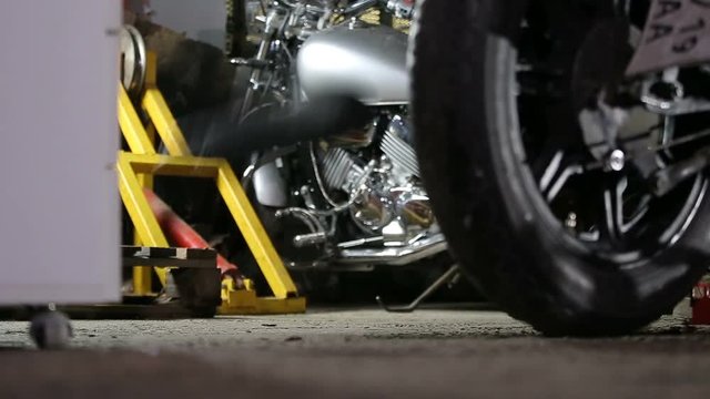 Old motorcycle seat falls down on the floor before reparing