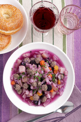 Purple carrot soup with meatballs
