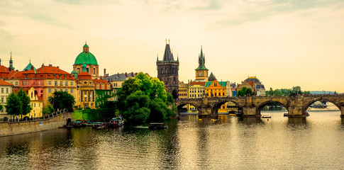 Fototapeta na wymiar Romantic Prague cityscape, Czech Republic. Panoramic view of the old city of the hundred towers on a summer day.