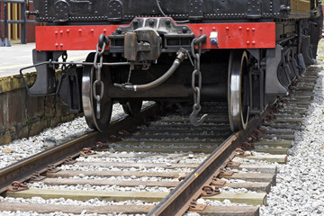 Close-up of old steam locomotive wheels, now tourist attraction