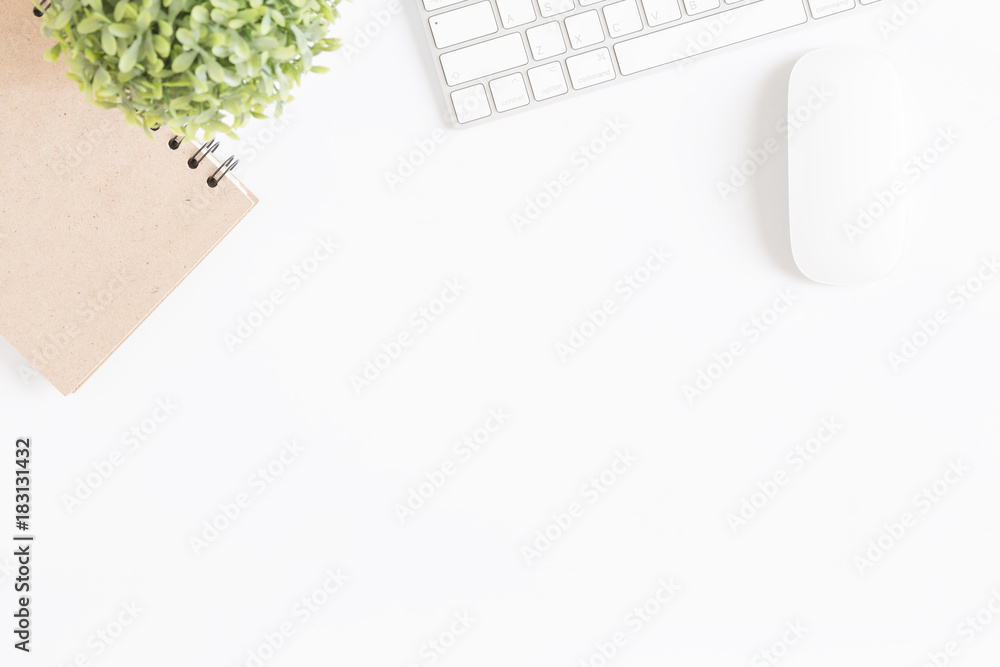Wall mural flat lay photo of office desk with mouse and keyboard,copy space on white background,top view
