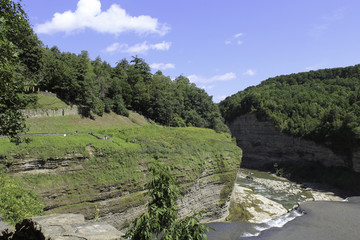 Fototapeta na wymiar River running through the steep baanks of the gorge at Letchworth State Park