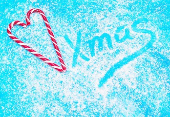 Christmas candy on a blue background 
