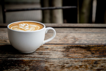 coffee cup on wood table