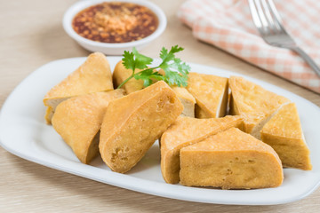 Fried tofu on plate and dip sauce