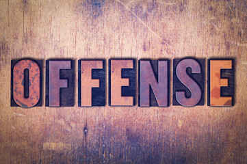 Offense Theme Letterpress Word on Wood Background