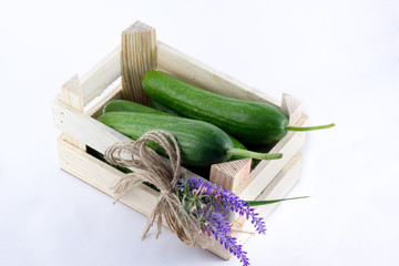 a small crate with tomatoes