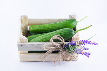 a small crate with tomatoes