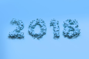 Liquid blue 2018 number with drops on blue background