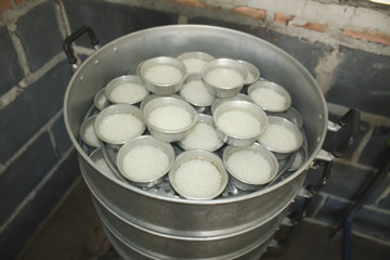 Jasmine rice cooking to feed people