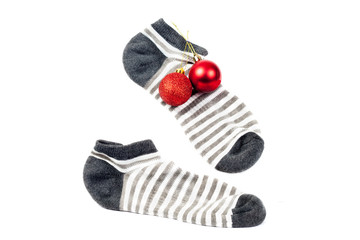 black and white sock with Christmas balls on white background.