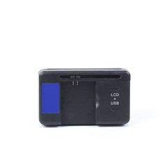 Multi function mobile usb charger on white background.