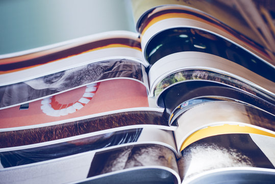 Many opened magazines