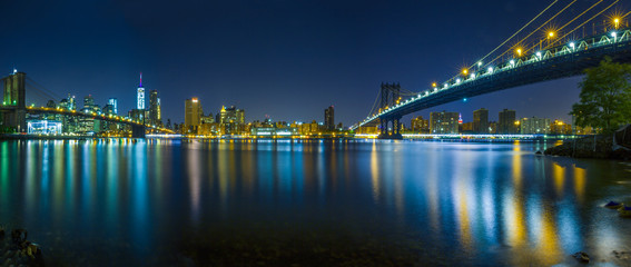Manhattan and Brooklyn Bridges panorama from DUMBO