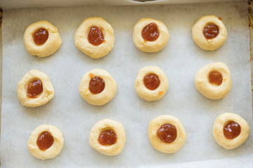 Uncooked jam drops / cookies on baking tray