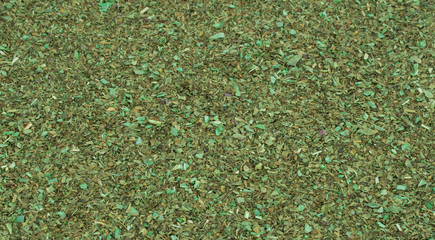 Dried basil aromatic herbs background