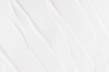 Fototapeta na wymiar White abstract grainy with rippled wave background.