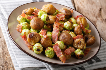 hearty salad of chestnuts, Brussels sprouts and bacon close-up. horizontal